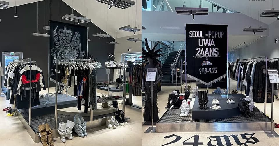 옷걸이와 진열대가 놓인 팝업 매장 내부
