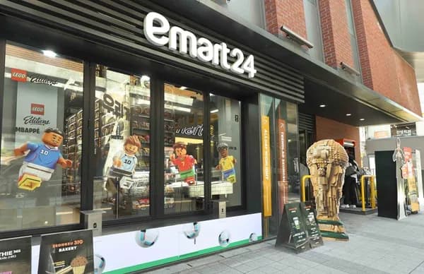 Convenience store front decorated with LEGO football figures