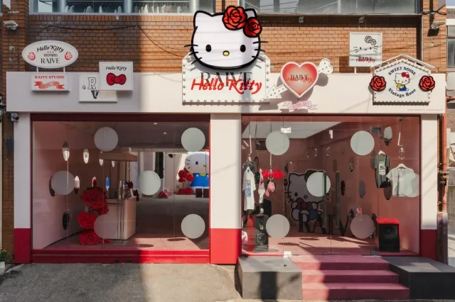 Red storefront decorated with Hello Kitty